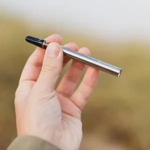 cbd vape pen in hand
